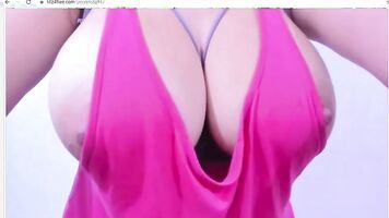 Latina in pink seduces me with her big tits